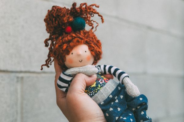 Gwen - Waldorf Inspired Wool Filled pint sized doll with removable clothing and Teeswater locks for hair